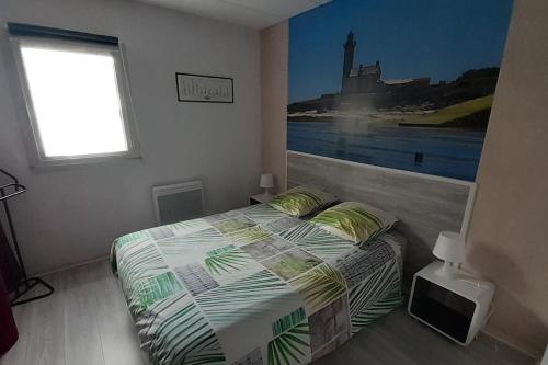Postel nebo postele na pokoji v ubytování Appartement, parking privé, balcon
