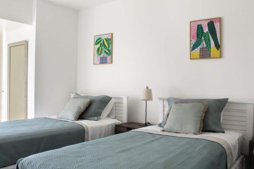 En eller flere senge i et værelse på HOM I Terraza y Vista Panorámica al Mar I Mall I Wifi I Av Balmaceda PMN 0621