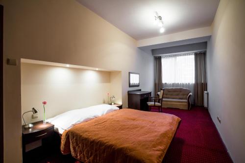Katil atau katil-katil dalam bilik di Hotel *** NAT Ustroń