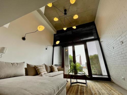 Istumisnurk majutusasutuses HOM I Loft con Jardín Nuevo mejor proyecto de Valparaíso