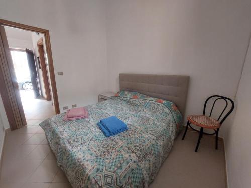 Säng eller sängar i ett rum på Casa di Jibran