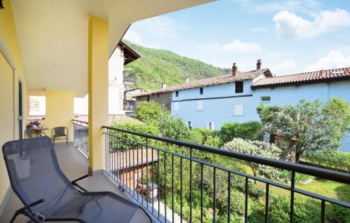 a balcony with a view of the mountains at Pet Friendly Apartment in Borgofranco dʼIvrea