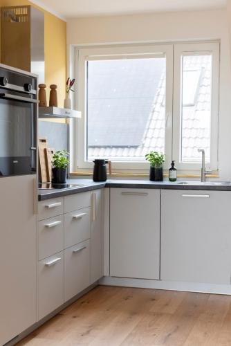 Η κουζίνα ή μικρή κουζίνα στο Pier21 FINE LOFTS