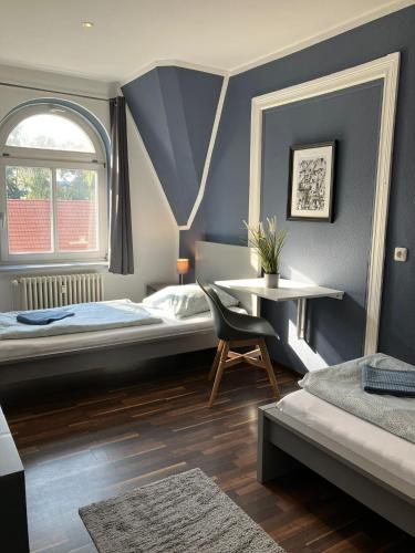 Ένα ή περισσότερα κρεβάτια σε δωμάτιο στο Blue Doors Hostel Altstadt
