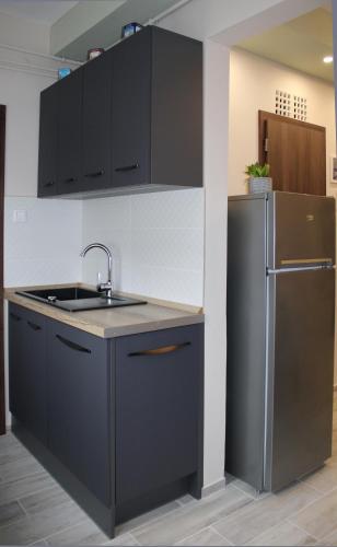 Una cocina o cocineta en Pitypang Apartman