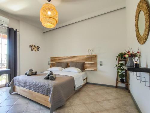 Postel nebo postele na pokoji v ubytování Athos Studio