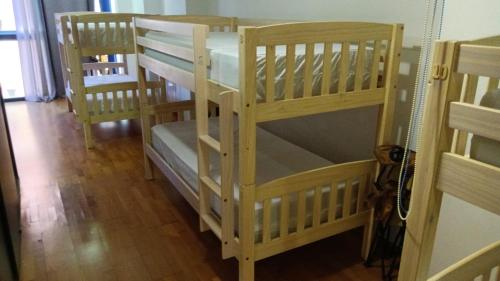 a couple of bunk beds in a room at Albergue Camino Santiago Porriño - En Pleno Centro - City Centre in Porriño