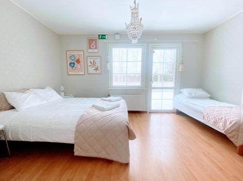 Кровать или кровати в номере Expe Finland