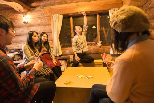 Clientes alojados en Yufuin Log House no Yado Tom Sawyer