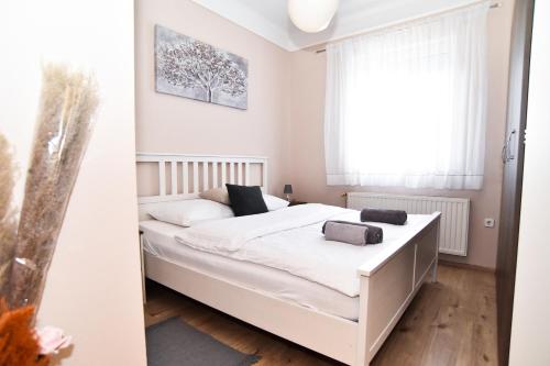 Postel nebo postele na pokoji v ubytování Apartman Podravina