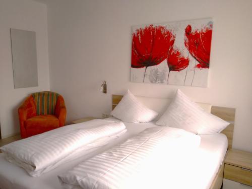 Postel nebo postele na pokoji v ubytování Appartements am Kirchplatz