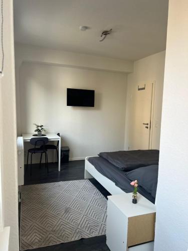 TV a/nebo společenská místnost v ubytování Genesis Apartments