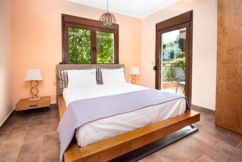 Postel nebo postele na pokoji v ubytování Villa Maria Luxury