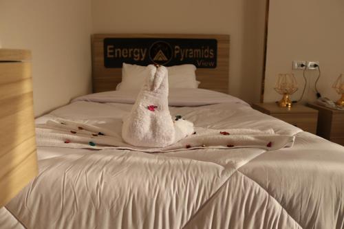 Postel nebo postele na pokoji v ubytování Energy Pyramids View