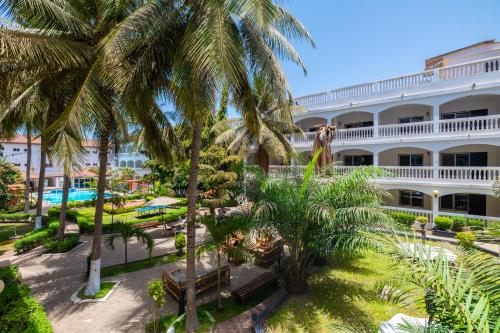 an aerial view of the resort with palm trees at Sarges Hotel in Sere Kunda