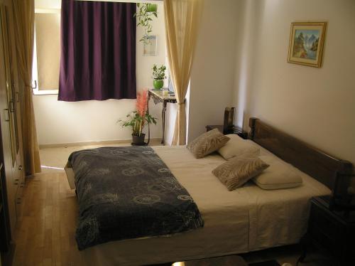 Postel nebo postele na pokoji v ubytování Studio Apartments Fabjanac