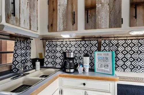 a kitchen with a coffee maker on a counter at #StayinMyDistrict Twin Falls Backyard Glamper in Twin Falls