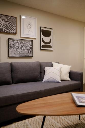 a living room with a couch and a coffee table at #StayInMyDistrict Piedmont Near Parks and Shopping in Portland
