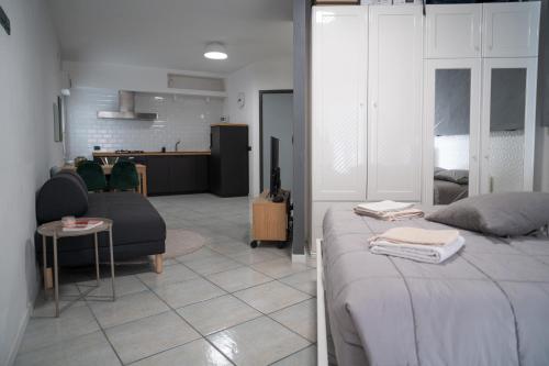 Una cama o camas en una habitación de Ratafià