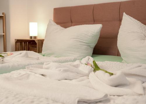 Ένα ή περισσότερα κρεβάτια σε δωμάτιο στο Apartmenthaus Rankestraße 4