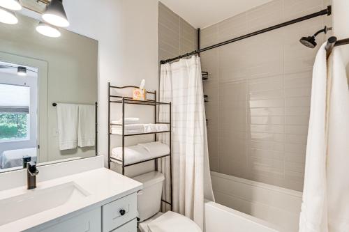 a bathroom with a sink and a toilet and a shower at Pet-Friendly Nashville Townhouse with Private Deck! in Nashville