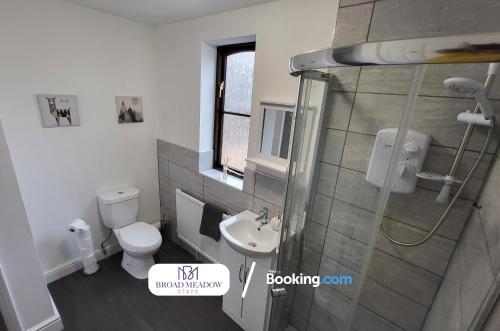 a bathroom with a toilet and a sink at 3 Bedroom House By Broad Meadow Stays Short Lets and Serviced Accommodation Lincoln With Parking in Lincoln