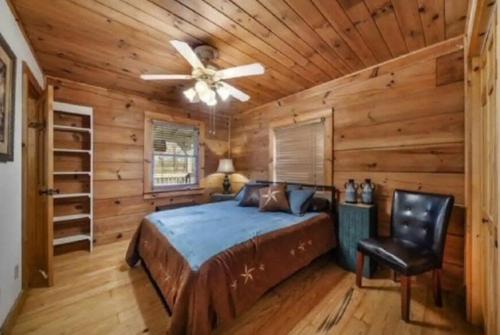 a bedroom with a bed and a ceiling fan at Pigeon Ridge Cabin Cumberland State Park 2B 2B in Crossville