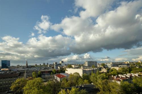 Nespecifikovaný výhled na destinaci Lodž nebo výhled na město při pohledu z apartmánu