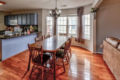 a kitchen and dining room with a table and chairs at Home near all Sevier County attractions! in Pigeon Forge