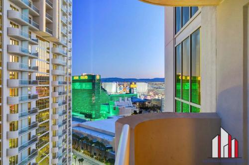 a view of a city from the balcony of a building at MGM Signature-25-702 1Bedroom 2Bath Balcony Suite in Las Vegas