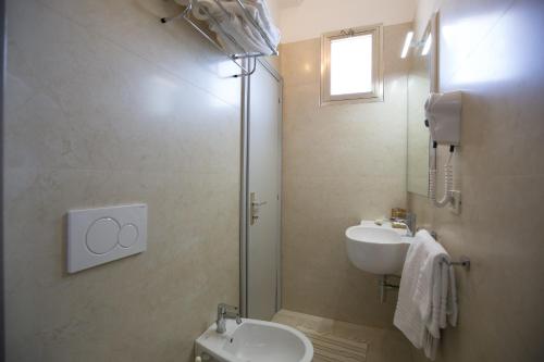 Ett badrum på Hotel Brunella