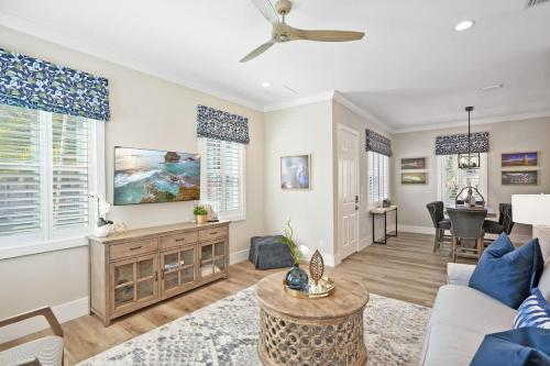 a living room with a couch and a table at Lincolnville Luxe Upscale Home in Heart of St Aug in St. Augustine