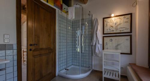 a bathroom with a shower and a toilet and a sink at Ca'Novae - Tuscany Farmhouse in Montieri