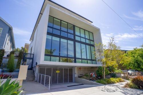 a large house with glass windows at Bright and Trendy - Panoramic - Chic - Prime Location in San Diego