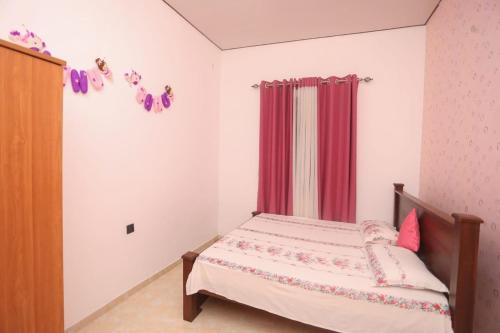 Giường trong phòng chung tại Rockhill Holiday Bungalow