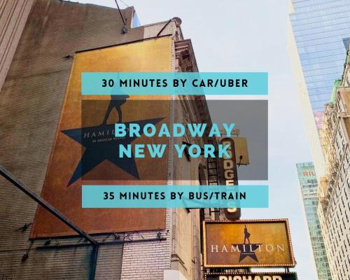 a banner on a building that reads broadway new work at 15 Minutes to NYC - Large Home - Great Location in Hoboken