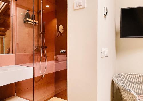 a bathroom with a shower and a sink at Al Pio Luxury Nest in Treviso