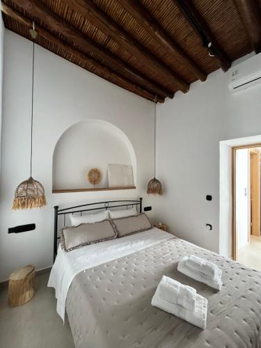 Postel nebo postele na pokoji v ubytování Casa Stergia - Village Project