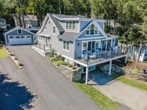an overhead view of a house with a driveway at Beautiful Home 30 Feet from the Sand at Spofford Lake! in Chesterfield