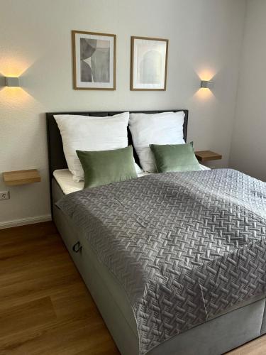 Кровать или кровати в номере Home & Apart - Apartment im Herzen von Kreyenbrück - Apartment 1