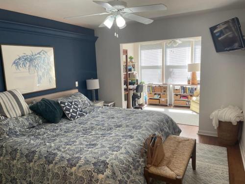 a bedroom with a bed and a ceiling fan at Gorgeous 3 Bedroom Home in the Dunes Sleeps 8 in Sanibel