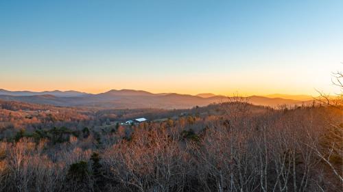 a view of the mountains from the top of a hill at Hawksnest in Mashburn Mill