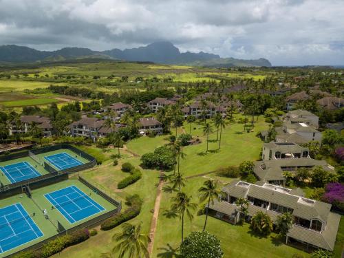 an aerial view of a resort with two swimming pools at Kahala 312 in Kipu