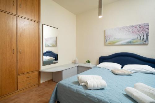 Ένα ή περισσότερα κρεβάτια σε δωμάτιο στο Poline Apartment