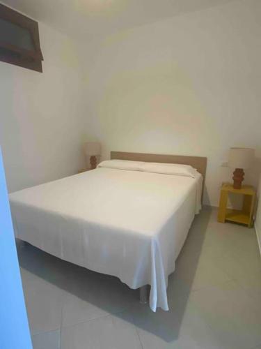 Postel nebo postele na pokoji v ubytování perla bilocale sul mare costa dei trabocchi