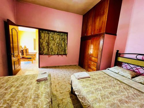 Ein Bett oder Betten in einem Zimmer der Unterkunft La casa de doña Juanita