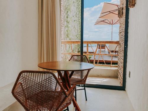Ein Balkon oder eine Terrasse in der Unterkunft Apenunga Eco Hotel