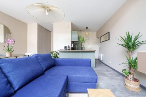Posezení v ubytování Appartement lumineux avec cour
