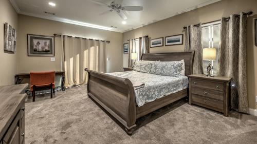 a bedroom with a bed and a desk in it at Jump Right In in Blue Ridge