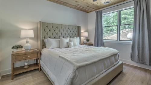 Ένα ή περισσότερα κρεβάτια σε δωμάτιο στο Juniper Ridge